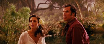 Movie still from “Casa de mi Padre” (2012), directed by Matt Piedmont – A man and a woman standing next to each other in front of trees; Close Up shot, Over the shoulder angle