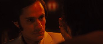 Movie still from “Casa de mi Padre” (2012), directed by Matt Piedmont – A person holding a cell phone; Close Up shot, Over the shoulder angle