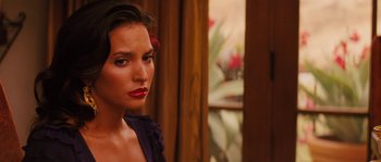 Movie still from “Casa de mi Padre” (2012), directed by Matt Piedmont – A woman with red lipstick looking into a mirror; Close Up shot, Over the shoulder angle