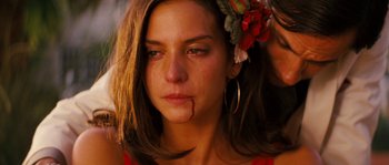 Movie still from “Casa de mi Padre” (2012), directed by Matt Piedmont – A woman with a flower in her hair; Close Up shot, Over the shoulder angle