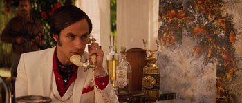 Movie still from “Casa de mi Padre” (2012), directed by Matt Piedmont – A man talking on a phone in a room; Close Up shot, Low angle