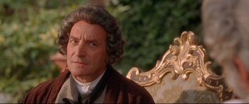 Movie still from “Casanova” (2005), directed by Lasse Hallström – An older man is sitting on a chair; Close Up shot, Over the shoulder angle