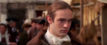 Movie still from “Casanova” (2005), directed by Lasse Hallström – A person wearing a coat; Close Up shot, Over the shoulder angle