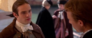 Movie still from “Casanova” (2005), directed by Lasse Hallström – A group of people dressed in period clothing; Close Up shot, Over the shoulder angle