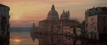 Movie still from “Casanova” (2005), directed by Lasse Hallström – A view of a canal with a church in the background; Extreme Wide shot, Low angle