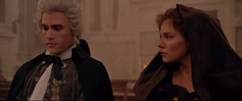 Movie still from “Casanova” (2005), directed by Lasse Hallström – Two people standing next to each other near a wall; Close Up shot, Over the shoulder angle