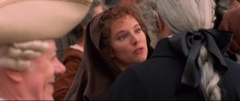 Movie still from “Casanova” (2005), directed by Lasse Hallström – A person wearing a headscarf; Close Up shot, Over the shoulder angle