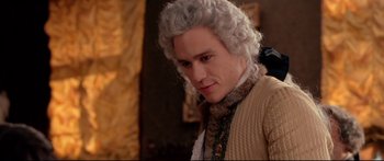 Movie still from “Casanova” (2005), directed by Lasse Hallström – A man with a white wig and a beard; Close Up shot, Over the shoulder angle