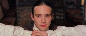 Movie still from “Casanova” (2005), directed by Lasse Hallström – A person wearing a shirt and tie; Close Up shot, High angle