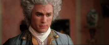 Movie still from “Casanova” (2005), directed by Lasse Hallström – A person wearing a suit and a wig; Close Up shot, High angle