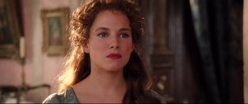 Movie still from “Casanova” (2005), directed by Lasse Hallström – A person with curly brown hair; Close Up shot, Over the shoulder angle