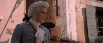 Movie still from “Casanova” (2005), directed by Lasse Hallström – A person wearing a wig; Medium shot, Low angle