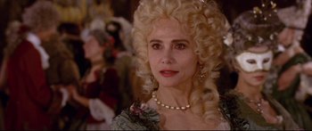 Movie still from “Casanova” (2005), directed by Lasse Hallström – An older woman in a long wig and pearls; Close Up shot, Over the shoulder angle