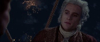 Movie still from “Casanova” (2005), directed by Lasse Hallström – A person wearing a suit and tie; Close Up shot, High angle