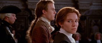 Movie still from “Casanova” (2005), directed by Lasse Hallström – A man and a woman standing next to each other; Close Up shot, Over the shoulder angle