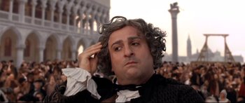 Movie still from “Casanova” (2005), directed by Lasse Hallström – A person wearing a suit and bow tie; Close Up shot, Low angle