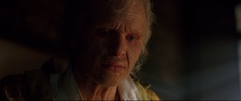 Movie still from “Casanova” (2005), directed by Lasse Hallström – An old woman with white hair looking sad; Close Up shot, Low angle