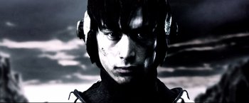 Movie still from “Casshern” (2004), directed by Kazuaki Kiriya – A person wearing headphones; Close Up shot, Low angle