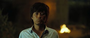 A person wearing a white shirt