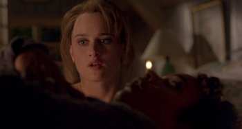 Movie still from “The Craft” (1996), directed by Andrew Fleming – A person looking at the camera; Close Up shot, Over the shoulder angle