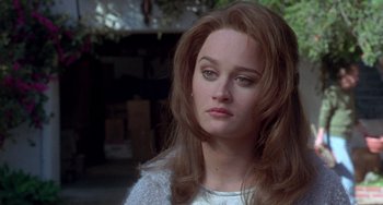 Movie still from “The Craft” (1996), directed by Andrew Fleming – A person with long brown hair; Close Up shot, Over the shoulder angle