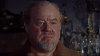 Movie still from “Cat on a Hot Tin Roof” (1958), directed by Richard Brooks – An older man with a beard and mustache; Close Up shot, Low angle