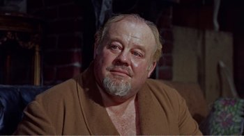 Movie still from “Cat on a Hot Tin Roof” (1958), directed by Richard Brooks – An older man with a beard and a mustache; Close Up shot, High angle