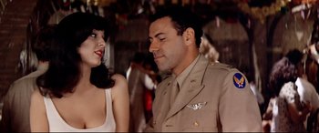 Movie still from “Catch-22” (1970), directed by Mike Nichols – A man and a woman in military uniforms; Close Up shot, Low angle