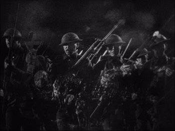 Movie still from “Cavalcade” (1933), directed by Frank Lloyd – A black and white photo of two men holding guns; Medium shot, Low angle