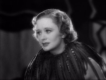 Movie still from “Cavalcade” (1933), directed by Frank Lloyd – An old black and white photo of a woman; Close Up shot, Low angle