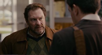 Movie still from “Cedar Rapids” (2011), directed by Miguel Arteta – An older man is talking to a younger man; Close Up shot, Over the shoulder angle