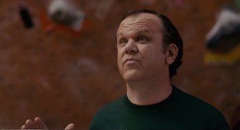 Movie still from “Cedar Rapids” (2011), directed by Miguel Arteta – A person looking up at something; Close Up shot, Low angle