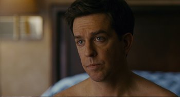 Movie still from “Cedar Rapids” (2011), directed by Miguel Arteta – A person wearing a shirt; Close Up shot, Over the shoulder angle