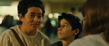 Movie still from “Central Station” (1998), directed by Walter Salles – A woman and a young boy looking at the camera; Close Up shot, Over the shoulder angle