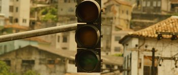 Movie still from “Central Station” (1998), directed by Walter Salles – A traffic light on a pole; Extreme Close Up shot, Low angle