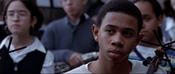 Movie still from “Changing Lanes” (2002), directed by Roger Michell – A young man is looking into the distance; Close Up shot, High angle