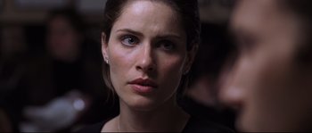 Movie still from “Changing Lanes” (2002), directed by Roger Michell – A person wearing a black shirt; Close Up shot, Over the shoulder angle