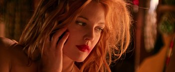 Movie still from “Charlie's Angels” (2000), directed by McG – A person with long red hair; Close Up shot, Low angle