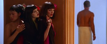 Movie still from “Charlie's Angels” (2000), directed by McG – Two women standing next to each other in front of a wall; Close Up shot, Low angle