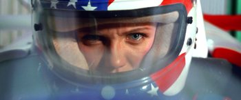 Movie still from “Charlie's Angels” (2000), directed by McG – A person wearing a helmet with stars on it; Close Up shot, Overhead angle