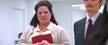 Movie still from “Charlie's Angels” (2000), directed by McG – A woman with a book in her hands; Close Up shot, Low angle
