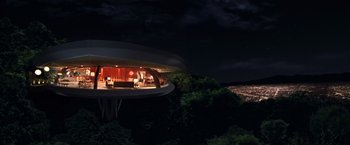 Movie still from “Charlie's Angels” (2000), directed by McG – A view of a building at night from a hill; Extreme Wide shot, Low angle