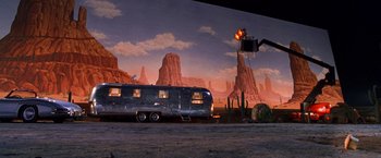 Movie still from “Charlie's Angels” (2000), directed by McG – An airstream parked in front of a desert scene; Extreme Wide shot, Low angle