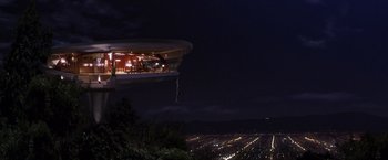 Movie still from “Charlie's Angels” (2000), directed by McG – A view of a city at night from the top of a hill; Extreme Wide shot, Low angle