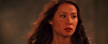 Movie still from “Charlie's Angels” (2000), directed by McG – A person with long hair; Close Up shot, Low angle