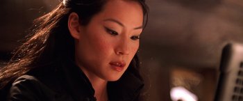 Movie still from “Charlie's Angels” (2000), directed by McG – A person wearing a black shirt; Close Up shot, High angle