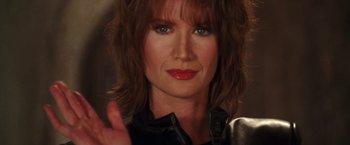 Movie still from “Charlie's Angels” (2000), directed by McG – A person wearing a leather jacket; Close Up shot, Low angle