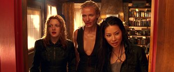Movie still from “Charlie's Angels” (2000), directed by McG – A group of women standing next to each other in a room; Close Up shot, Low angle