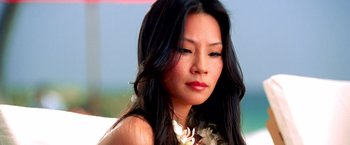 Movie still from “Charlie's Angels” (2000), directed by McG – A person with long black hair; Close Up shot, High angle