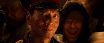 Movie still from “Charlie's Angels: Full Throttle” (2003), directed by McG – A person wearing a hat; Close Up shot, Low angle